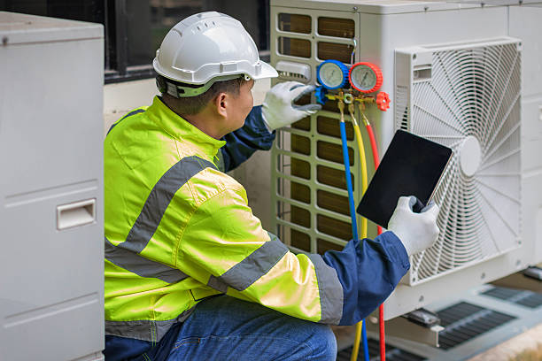 Professional Hvac technician working in Roxbury, MA